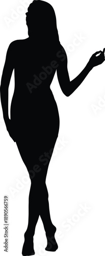 A woman in a dress standing with one hand raised