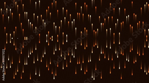 Abstract golden light streaks falling down on a dark background.