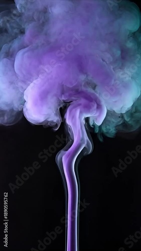 Colorful smoke swirls in vibrant purple and teal against black background  