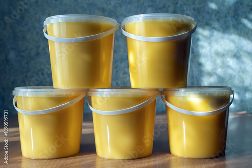 Honey in plastic containers