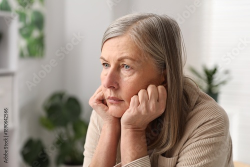 Slika na platnu Amnesia. Senior woman trying to remember something at home