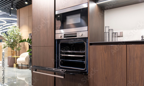 Konstfotografi Built-in oven and microwave appliance display in modern kitchen