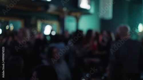 Wallpaper Mural Evening crowd with stage light, Faint crowd scene captured during night with distant stage lighting Torontodigital.ca