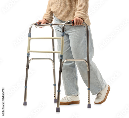 Mature woman using walker o...