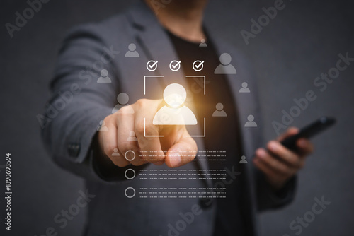 Canvas-taulu Business professional selecting glowing candidate symbol for recruitment decision, talent screening, human resource management, workforce selection and hiring process concept