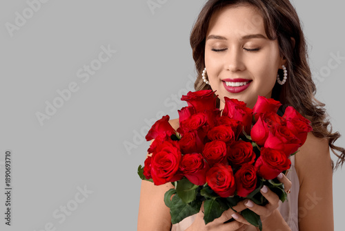 Smiling young woman with bo...