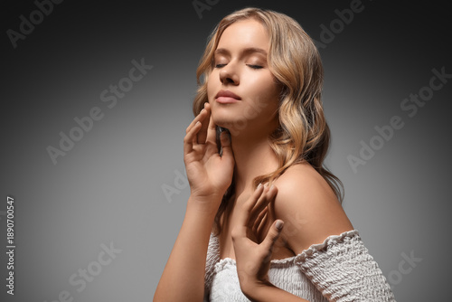Blonde young woman with bea...