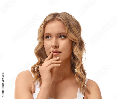 Blonde young woman with cur...