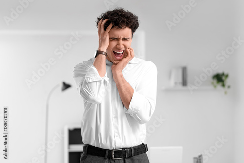 Screaming businessman havin...