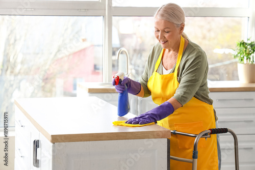 Mature woman with walker, d...