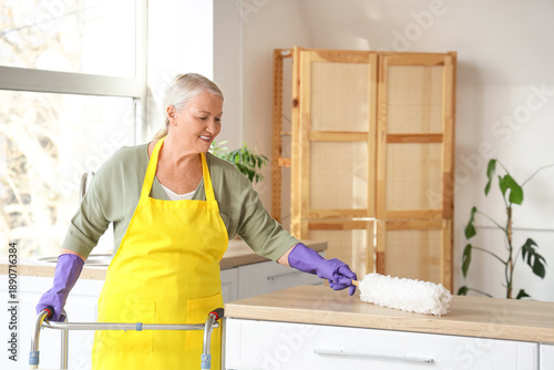 Mature woman with walker an...