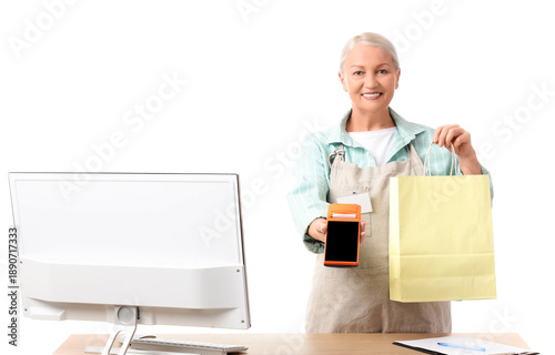 Mature female cashier with ...