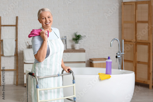 Mature woman with walker an...