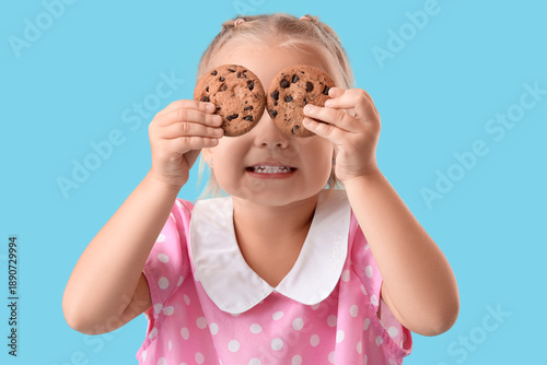 Cute little girl with tasty...