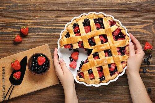 Female hands and baking dis...