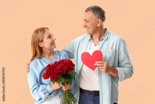 Happy mature couple with bo...