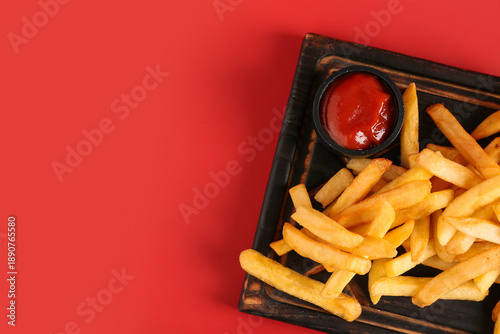 Wooden board with tasty fre...