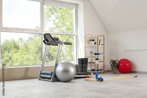 Interior of light gym with ...