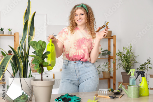 Young woman taking care of ...