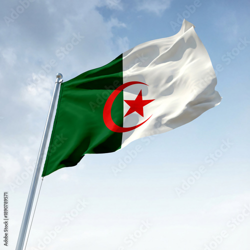 The Algerian flag flies in the sky
