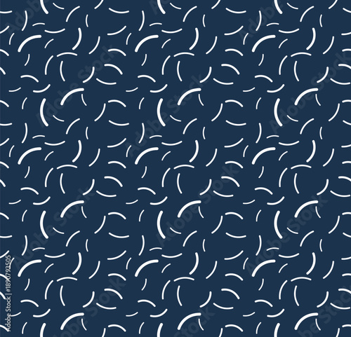 Seamless pattern with white hand drawn curved lines on dark blue background, abstract organic sprinkle texture.
