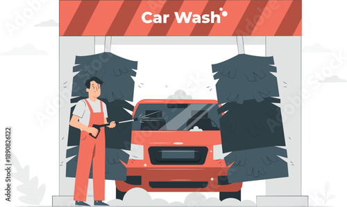 Man washing car at automated car wash facility with brushes and water spray