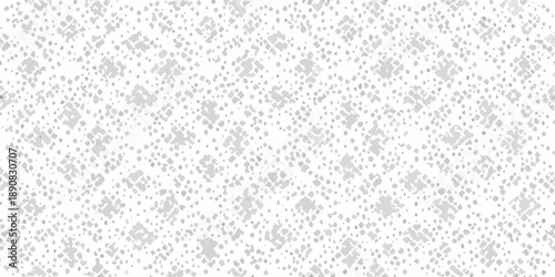 A grayscale abstract background featuring a dense speckled pattern throughout