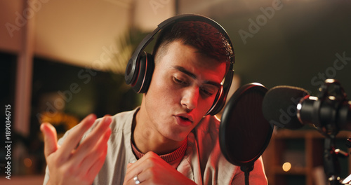 Photography Influencer, man and microphone for podcast, recording or night broadcast with radio host dj