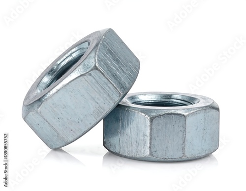 Two shiny metal nuts on white background