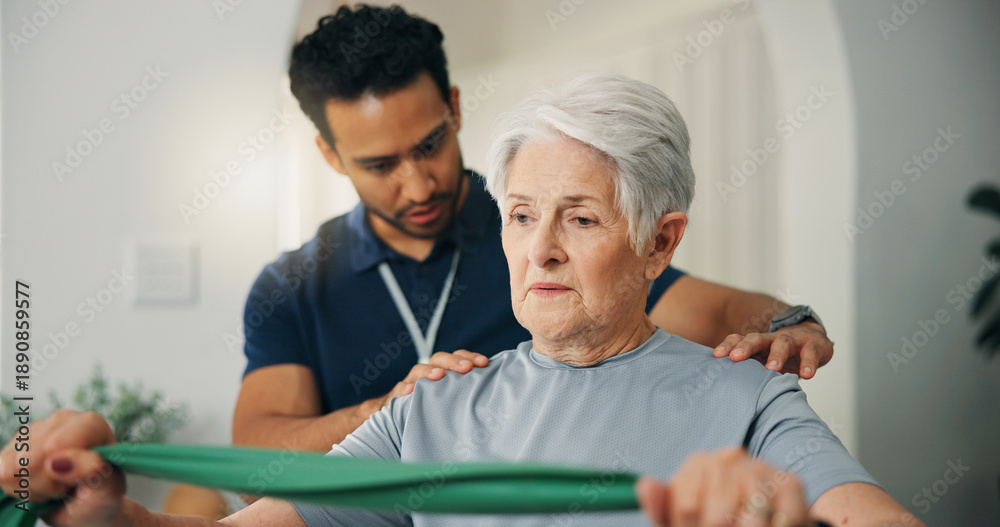 Obraz premium Senior woman, band and physiotherapist in home for strength training, mobility and recovery. Elderly person, physio and help with physical therapy, guidance and healthcare support for rehabilitation