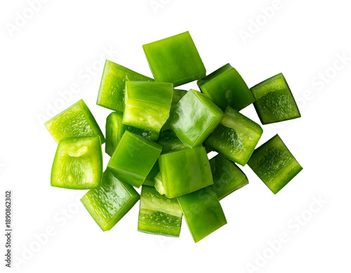 Vibrant green pepper chunks, roughly diced, isolated on a dark background