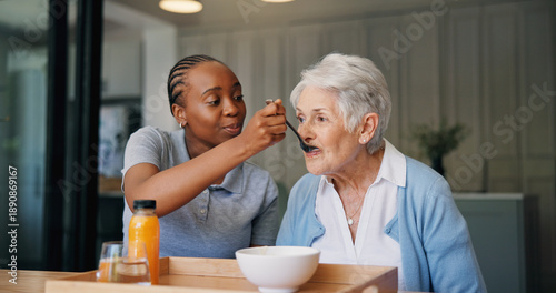 Fotografija Caregiver, breakfast and feeding senior woman for healthcare, wellness and support in morning