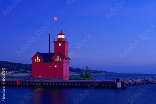 red lighthouse at night