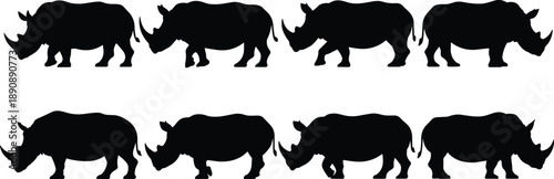 Rhinoceros silhouettes set, walking rhino animal shapes in side view, black wildlife illustration isolated on white