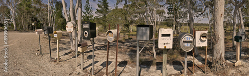 Canvastavla Bush boxes -letterboxes line the side of a dusty backroad in country New South Wales