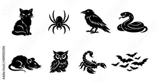 Black silhouettes of halloween animals and creatures in darkness