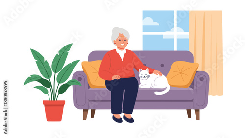 Happy elderly woman sitting on a purple sofa in her living room while affectionately petting her white pet cat.