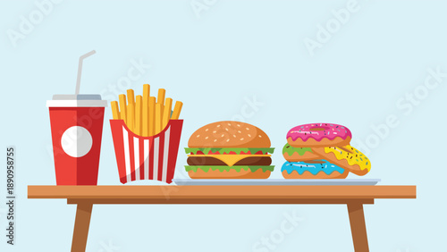 Tasty fast food meal consisting of a burger, french fries, a large soft drink, and colorful donuts on a wooden table.