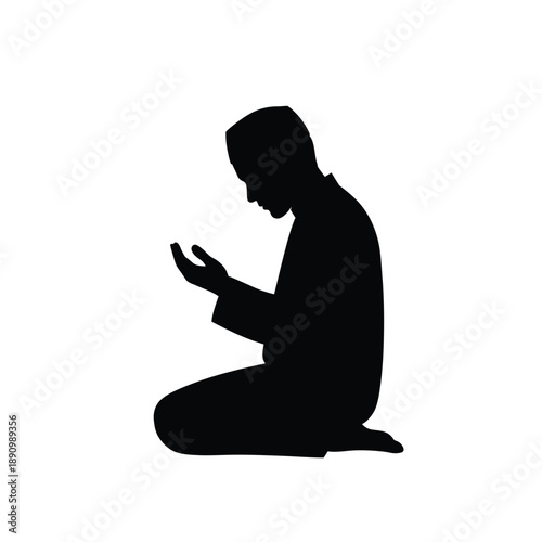 Silhouette of a Muslim man praying and making Dua isolated on white background