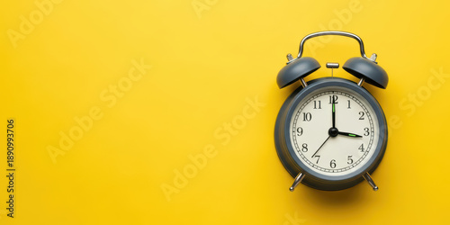 Alarm clock countdown time change future celebration planning end concept plan for new year 2025 2026 with yellow background and copy space minimal style hope