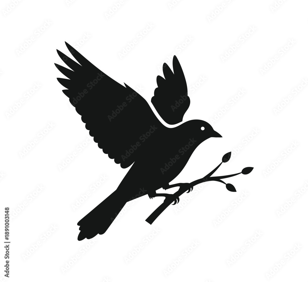 Fototapeta premium A black silhouette of a bird in flight with a branch