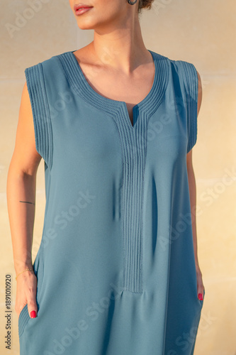 Qatar, Doha, 17.10.2022: Sleeveless blue abaya in close-up in natural light.