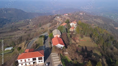 Drove aerial view of the little village of Castelletto d'Erro (Piedmont, Alessandria Province, Northern Italy). This hilly area is famous for its fine varieties of hazelnuts cultivation.