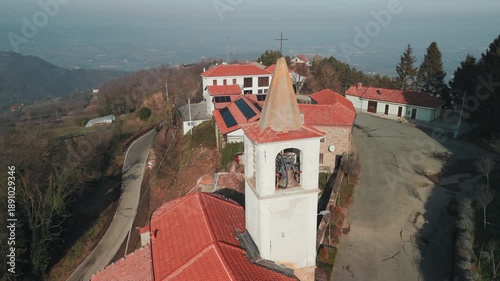 Drove aerial view of the little village of Castelletto d'Erro (Piedmont, Alessandria Province, Northern Italy). This hilly area is famous for its fine varieties of hazelnuts cultivation.