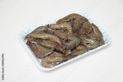 Raw Shrimp in Foam Tray Isolated on White Background