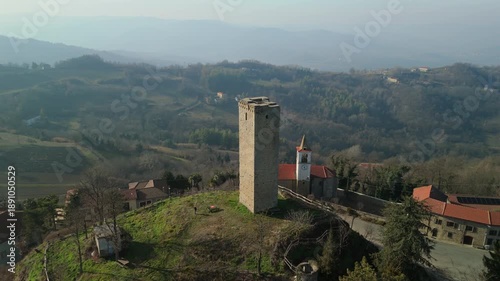 Drove aerial view of the little village of Castelletto d'Erro (Piedmont, Alessandria Province, Northern Italy). This hilly area is famous for its fine varieties of hazelnuts cultivation.