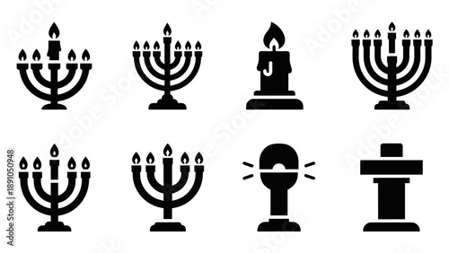 Set of eight black candle icons featuring menorah and other candle designs