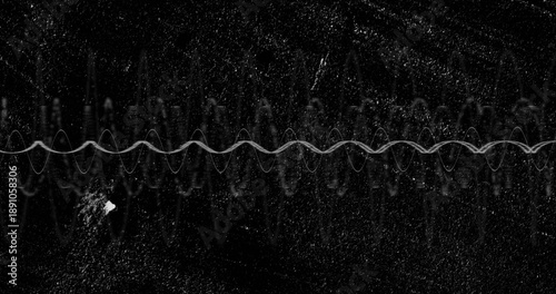 Photos Displaying primary white waveform across center on signal display with grainy no