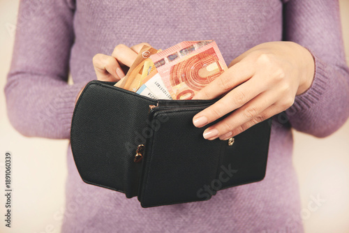 woman with purse and money