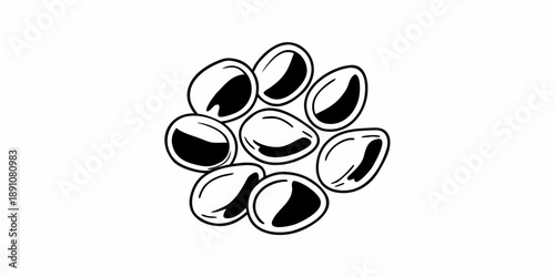 A cluster of coffee beans arranged in a circular pattern viewed from directly above